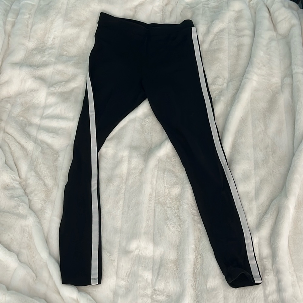 Black leggings with white stripe